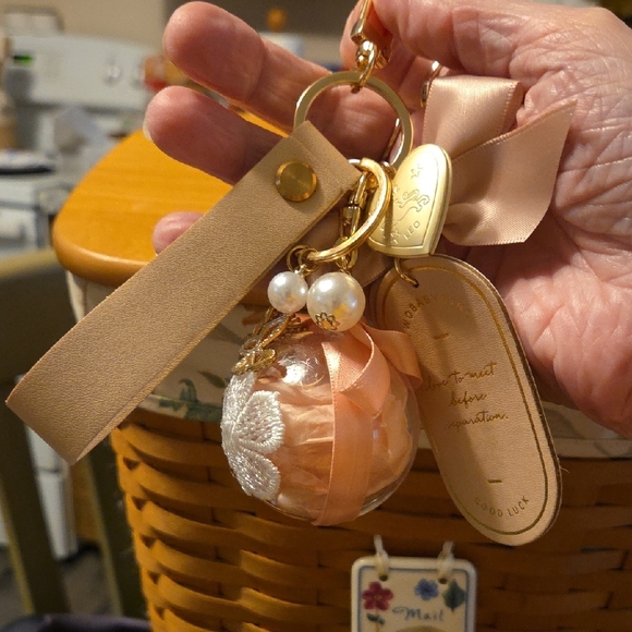 Elegant Tan Bag Charm Keychain with Bow and Charms - Picture 5 of 5